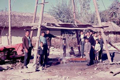 Villagers in Alang strike water after digging 110 meters. Klobe took this picture on the day he arrived in October 1964