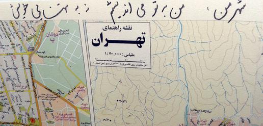 “My city, I think about you, not about my loneliness” (On top of a map of Tehran)