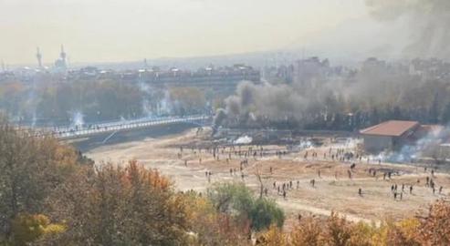 Riot police attacked farmers and their fellow protesters with tear gas and birdshot on the dried-up Zayanderud riverbed yesterday
