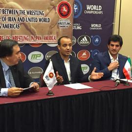 Hooman "Mo" Tavakolian (center) mediated discussions for cooperation between Iran wrestling legend Rasoul Khadem (r) and South American wrestling reps to promote the sport in the region