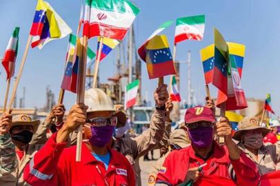 An Iranian tanker crew in Venezuela, which has also signed up to joint ventures with Iran on tractor and petrochemical plants