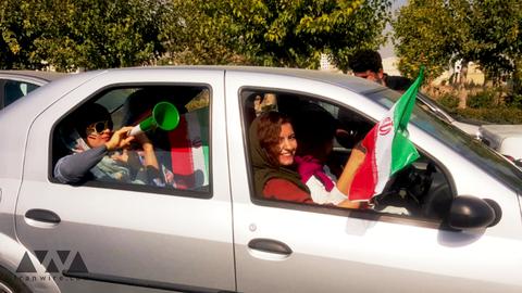 Iranian fans arrived at Azadi Stadium in a celebratory mood
