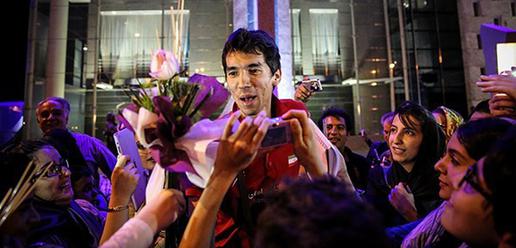 Volleyball team welcomed home by adoring fans