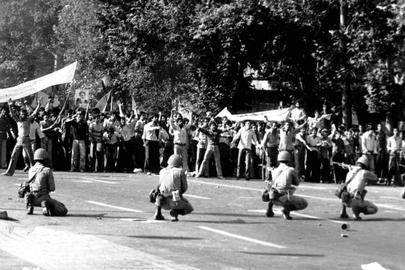 The Shah's soldiers face off against revolutionaries.