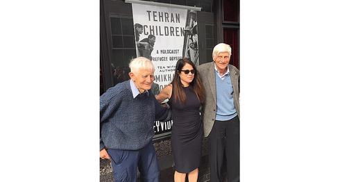 The brothers pictured with scholar Mikhal Dekel, who has painstakingly charted the refuge journey of her own father in a book, Tehran Children