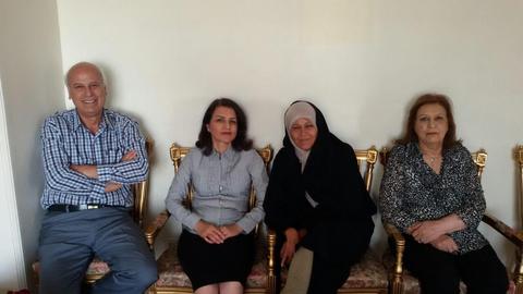 Faezeh Hashemi (second from right) in a meeting with Fariba Kamalabadi before she was released
