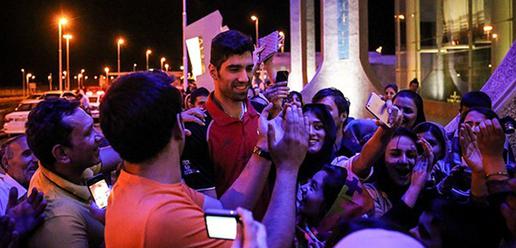 Volleyball team welcomed home by adoring fans
