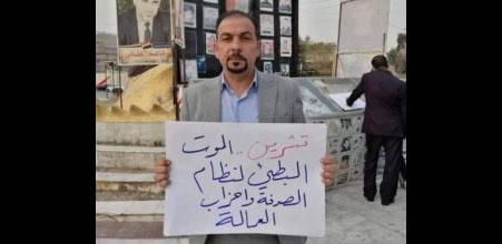 عکسی از ایهاب جواد الوزنی در خیابان الحداد شهر كربلا