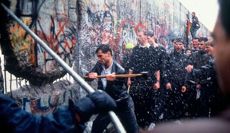 Berliners tear down the wall