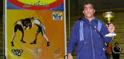 Wrestling champion Ali Abbasi Jozdani was imprisoned alongside violent criminals