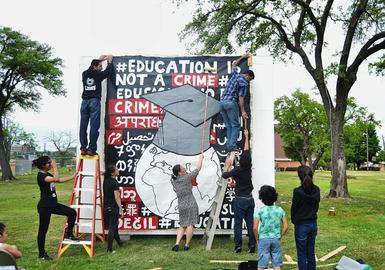The school got behind NotACrime's mural project to raise awareness about Bahai's of Iran and the ban on them pursuing higher education