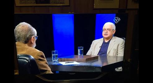 The so-called historian being interviewed by the talk show host Nader Talebzadeh before his fall from grace in Iran
