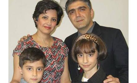 Baha'i Sahba Farnoush, seen here with his family, was arrested in Tehran