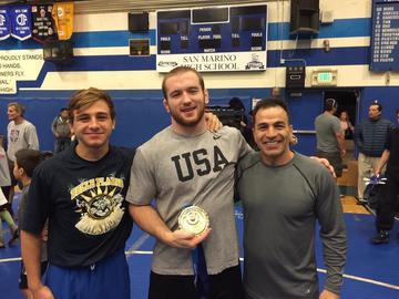 From left to right:  Reza Abedi’s youngest son Kian, USA World Champion Kyle Snyder, and Abedi
