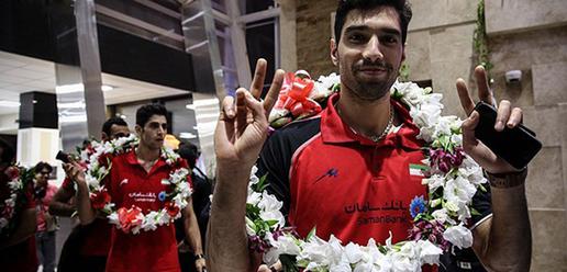 Volleyball team welcomed home by adoring fans