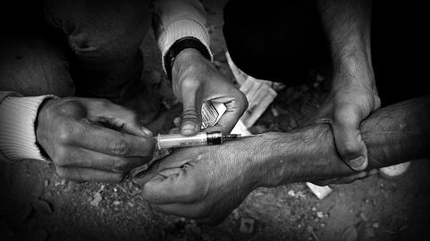Drug addiction can stem from poverty, depression, or from genetic or environmental factors. 
