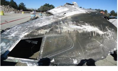 The cockpit: effects of smoke and fire and holes caused by the explosion are clearly visible