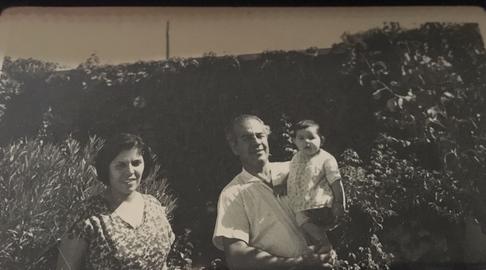 Lida as a child, with her mother and father. Copyright  Lida Taghinia