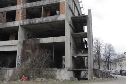 A group of migrants including Iranians live in this dilapidated building in the Bosnian city of Bihać
