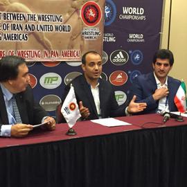 Mo 2: Hooman "Mo" Tavakolian (center) mediated discussions for cooperation between Iran wrestling legend Rasoul Khadem (r) and South American wrestling reps to promote the sport in the region