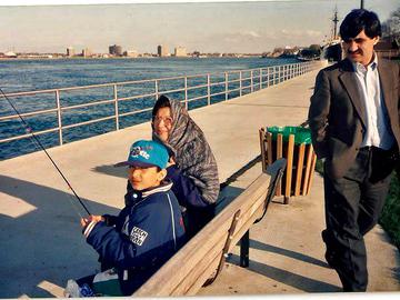 Amir fishing with his grandmother on her first visit to Michigan. This was the last time he saw her before his trip to Iran in 2011. 