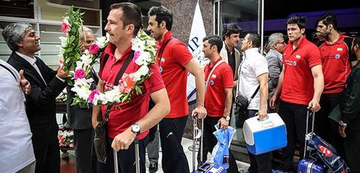 Volleyball team welcomed home by adoring fans