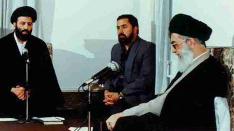 Ebrahim Raeesi, left, with Ali Khamenei, right, in the early 1990s