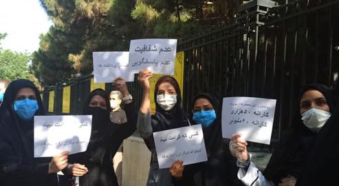 “No transparency, no accountability”: In protest over their unpaid wages, a group of nurses gathered in the campus of Shiraz Central Hospital in the capital of Fars province.