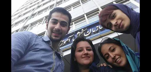 Tara Houshmand, Sarmad Shadabi and two other young Baha’is barred from attending university pose for a photograph outside the National Testing Organization
