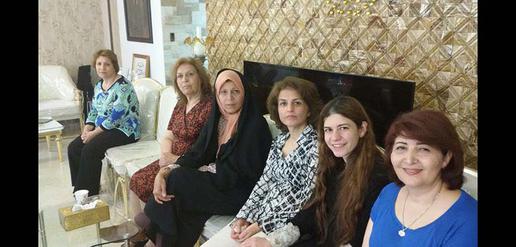 Faezeh Hashemi Rafsanjani (in chador) meets with Fariba Kamalabadi and members of the Baha’i Friends of Iran group