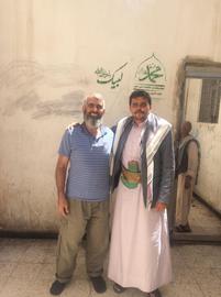 Hamid bin Haydara, who faces the death penalty, with activist Saleh Khatib al-Razehi