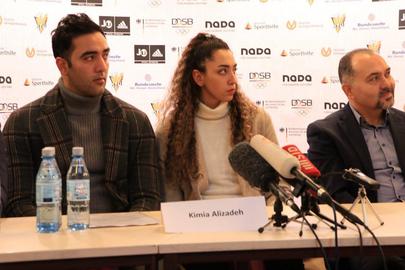 Kimia Alizadeh, the tae kwon do Olympic medalist who played formerly with Iran's national team, gives a press conference in Germany.