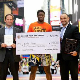 Tavak Partners managing director John Tush (l) and Tavakolian (r) with the winner of the "Become Your Own Dream" scholarship. Tavak Partners was set up in 2014 to facilitate his sports diplomacy work