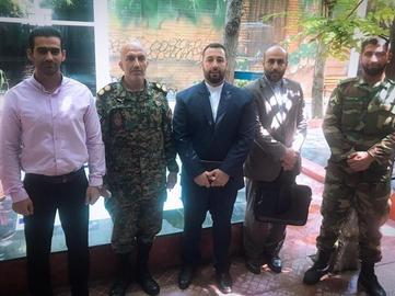 From left: Mahmoud Kouhi, representative of the kick-jitsu group at the riot police; Colonel Farzad Abbasi, head of Police Special Units’ Physical Education; Siamak Khorrami; Davoud Sharifi, head of Civil Institutions Committee; Erfan Mohammadi, official in charge the northern provinces at the riot police’s Physical Education Department.